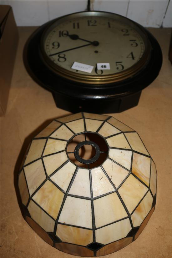 Enfield wall clock, telephone and a lamp shade